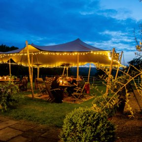 Lit up stretch tent in the dark - DP Marquees Ltd