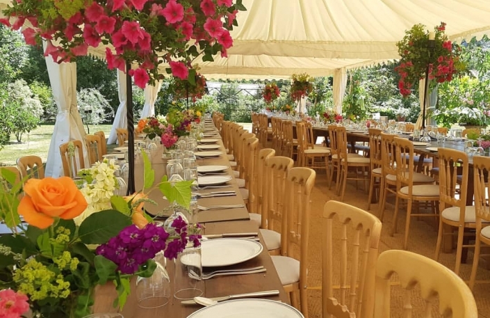 rustic tables and natural banqueting chairs - dp marquees ltd